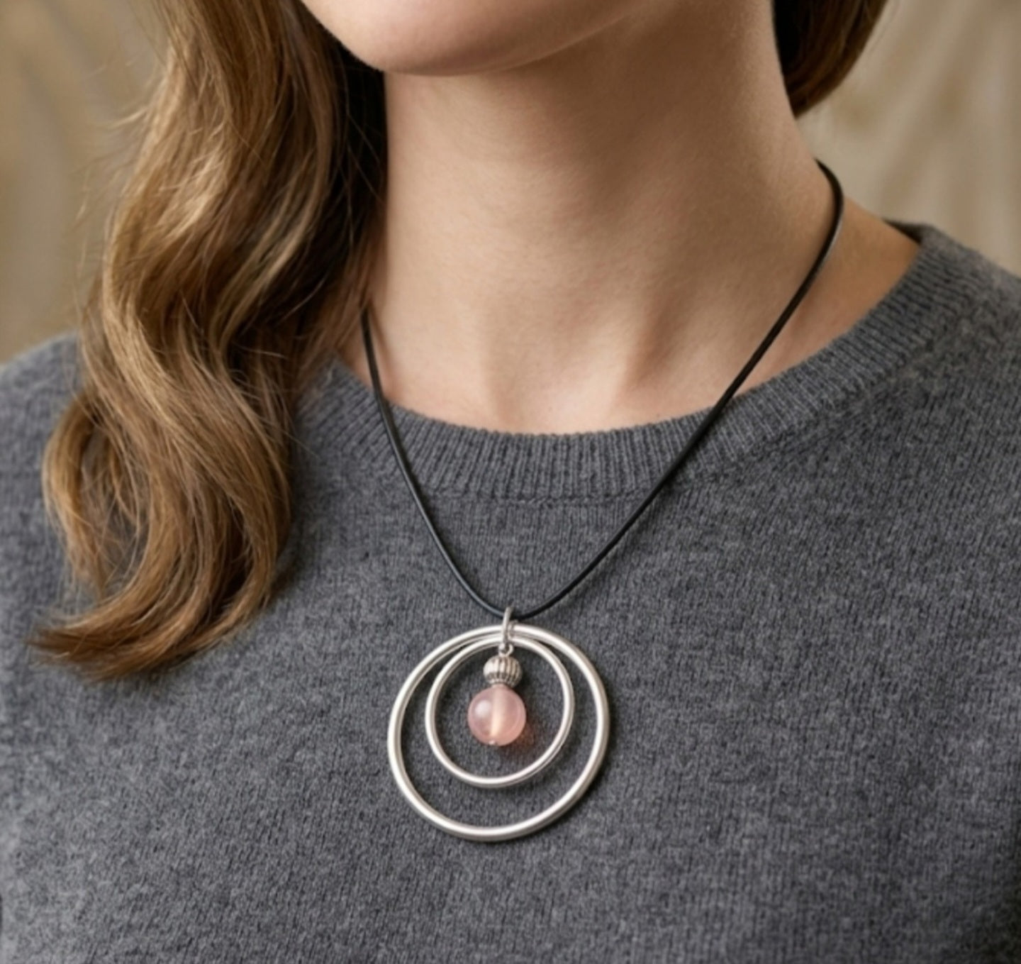 Modern Double-Ring Pendant Necklace with Pink Beaded Accent