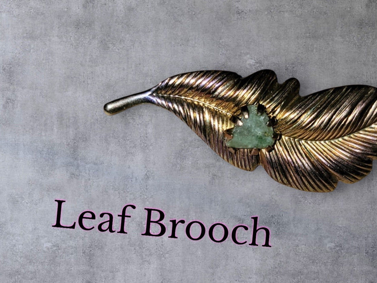 Vintage Gilded Feather Brooch with Raw Green Beryl Stone – Statement Pin